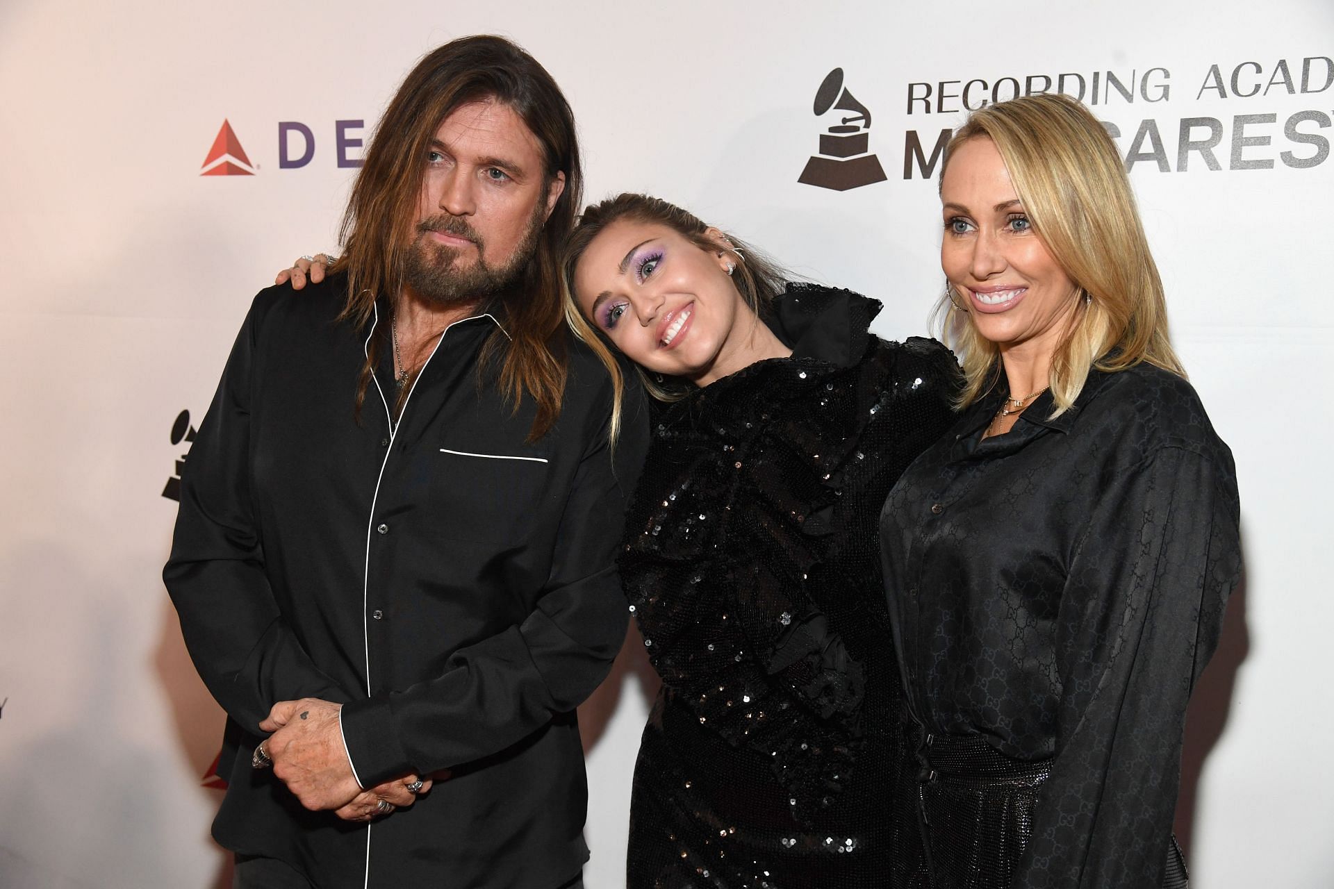 Miley Cyrus with parents Tish Cyrus and Billy Ray Cyrus - Source: Getty